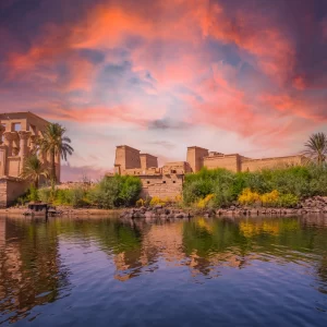 The Nile at sunrise in front of temple of Philae in Aswan, Egypt.